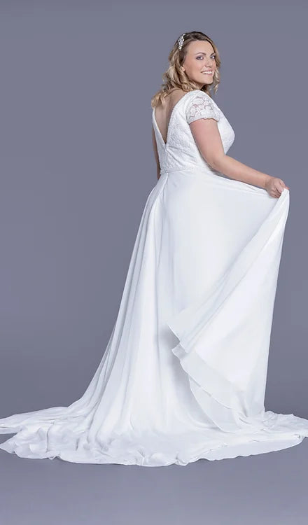 Plus size wedding dress with sleeves boho style