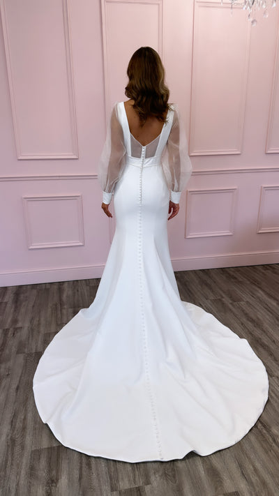 Long sleeve wedding dress with open back