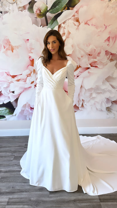 simple, long sleeve wedding dress with ruching