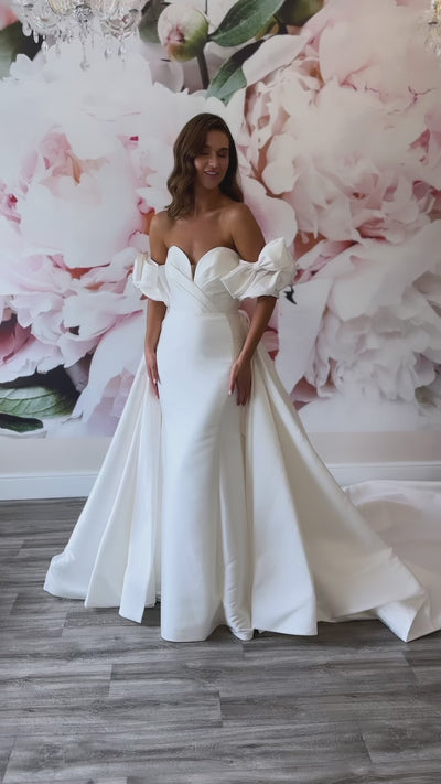 Simple, elegant wedding dress with sweet heart bodice for plus size bride