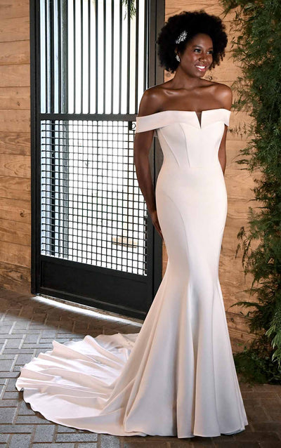 Off the shoulder fit and flare wedding dress with body contouring and elegant train